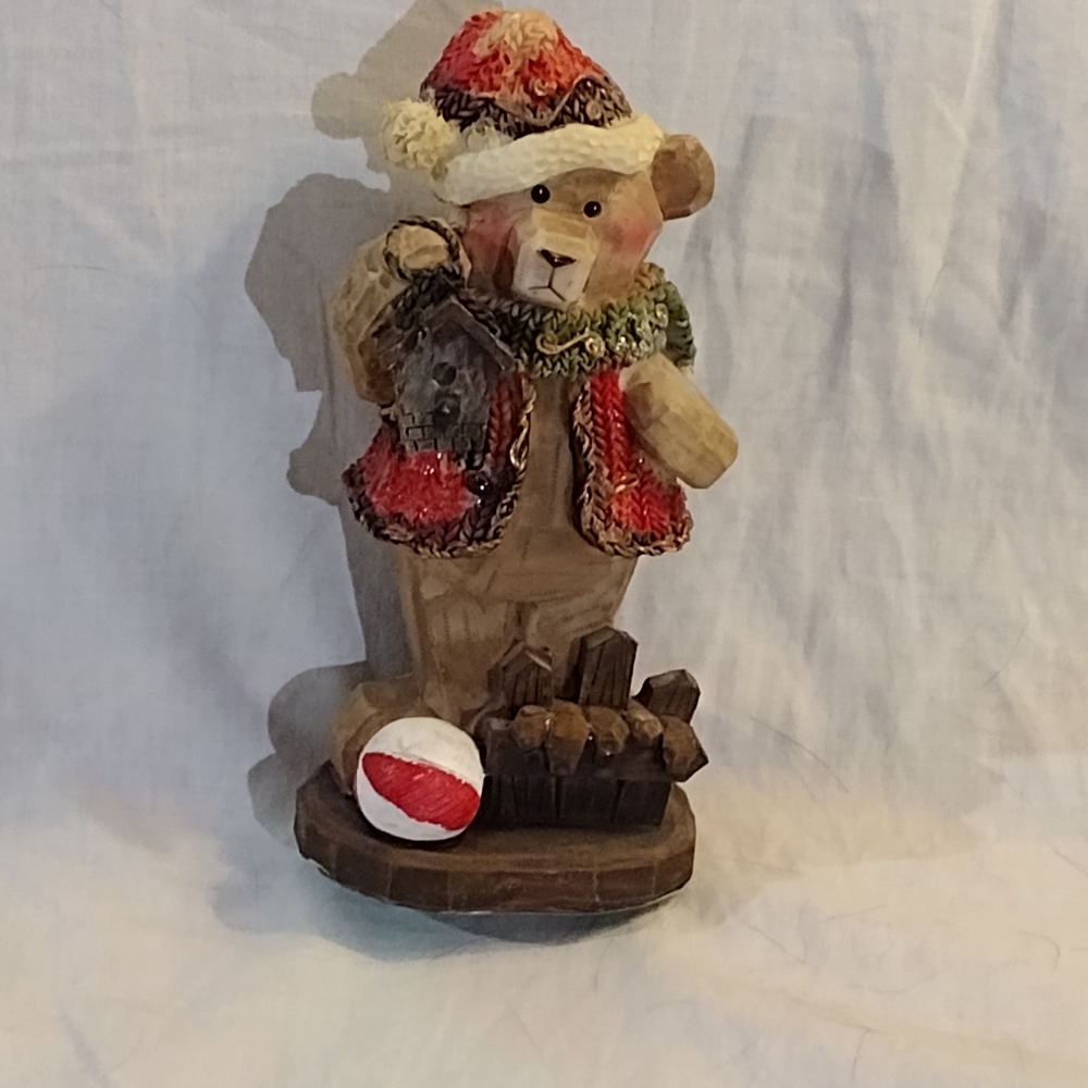 Festive Bear Figurine with Red and Brown Accents